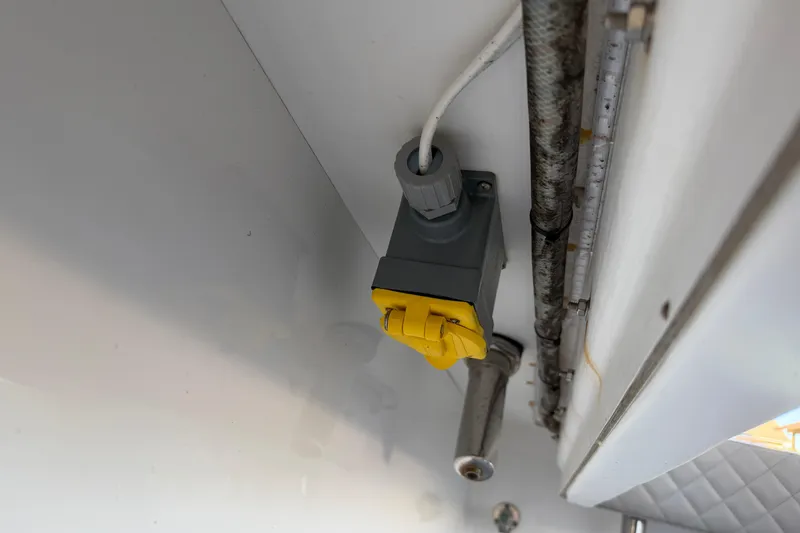 Slide: The Image of Freeman 33 boat interior detail, featuring storage compartment and speaker, 2013 model. - 67