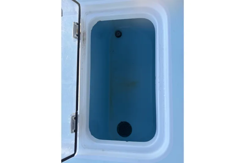 Slide: The Image of Interior view of a 2013 Freeman 33 boat showing wiring and fixtures. - 69