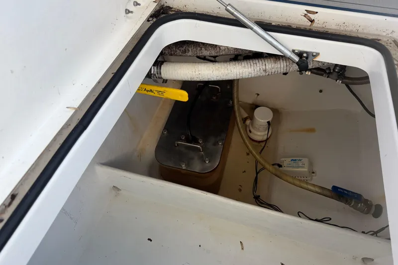 Slide: The Image of Open storage compartment on a 2013 Freeman 33 boat. - 72