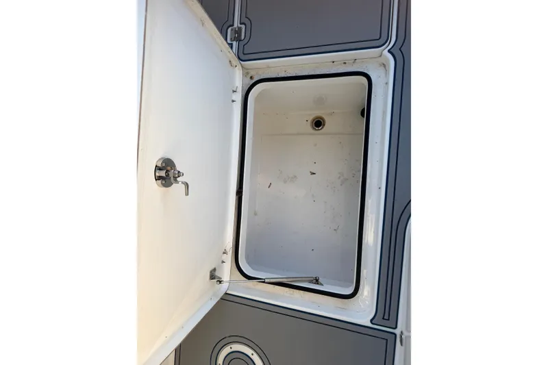 Slide: The Image of Freeman 33 boat with outboard motor on calm water, 2013 model. - 73