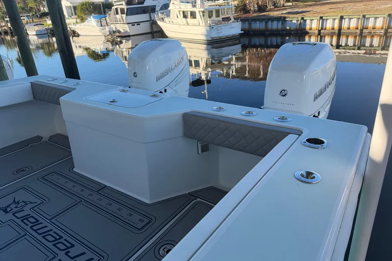 Slide: The Image of Minn Kota Instinct motor on Freeman 33, 2013 model, close-up view. - 9