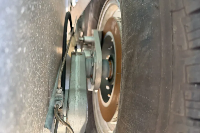 Slide: The Image of Close-up of Freeman 33 wheel and brake system, 2013 model. - 95