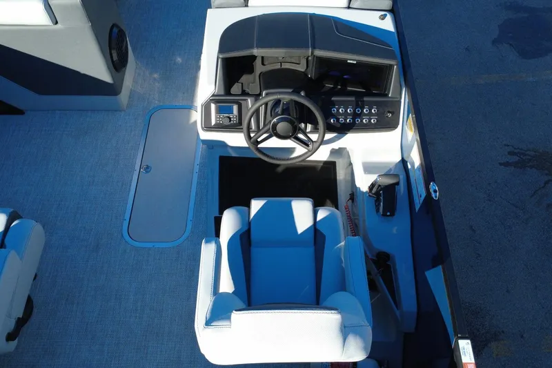 Slide: The Image of Alera M23Q 2026 boat cockpit with steering wheel and control panel. - 12