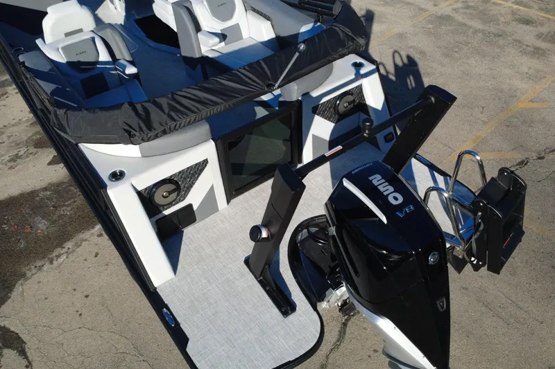 Slide: The Image of Alera M23Q 2026 boat with Mercury 250 V8 engine, featuring sleek seating and modern design. - 4