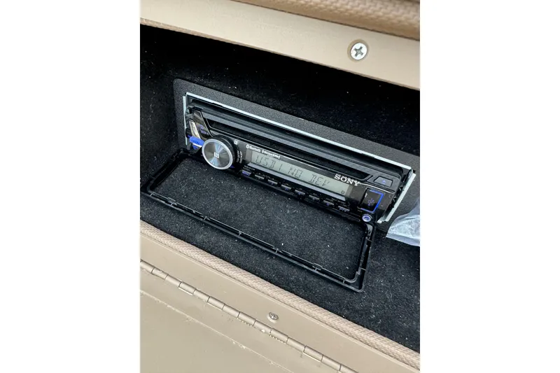 Slide: The Image of Sony stereo system in a 2010 Cobalt 276 boat dashboard. - 21