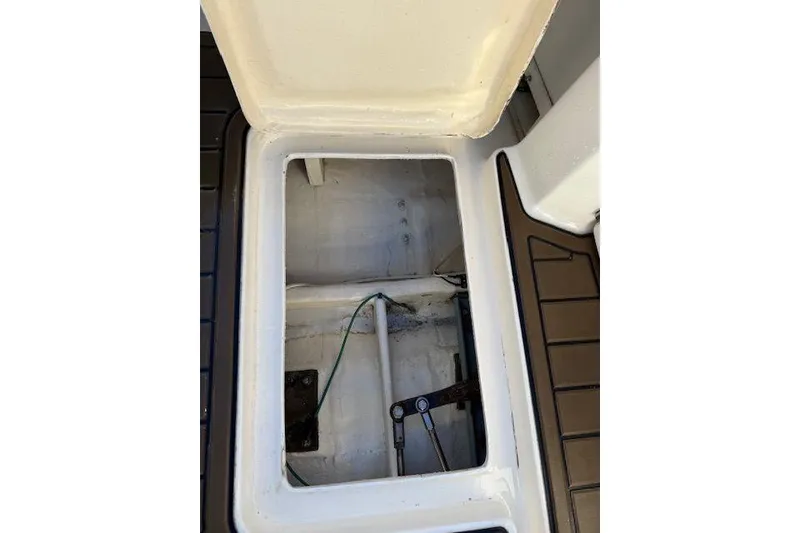 Slide: The Image of Open storage compartment on a 1997 Tiara Yachts 2900 Open boat. - 13