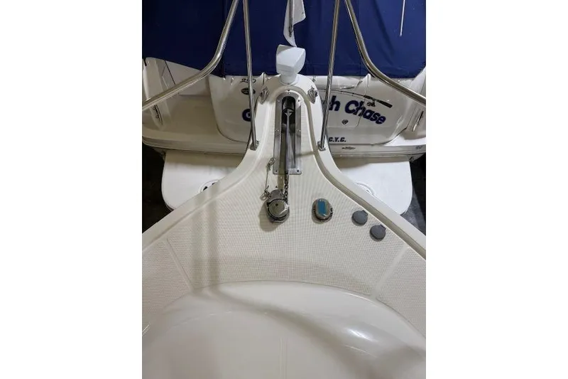 Slide: The Image of 1997 Tiara Yachts 2900 Open boat deck with anchor and fittings. - 14