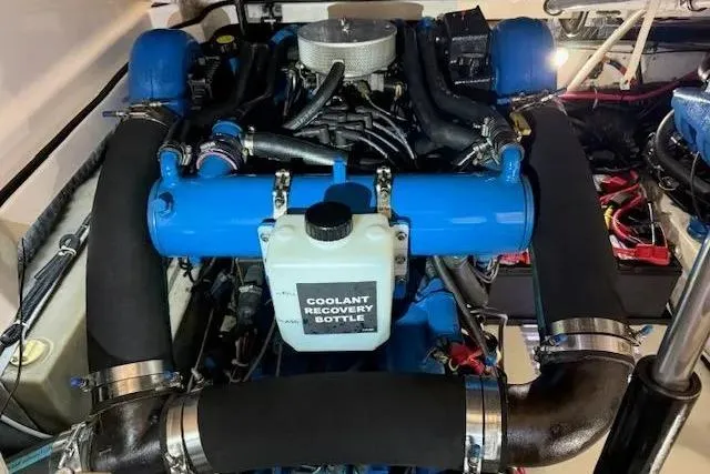 Slide: The Image of Engine compartment of a 1997 Tiara Yachts 2900 Open with visible coolant recovery bottle. - 20