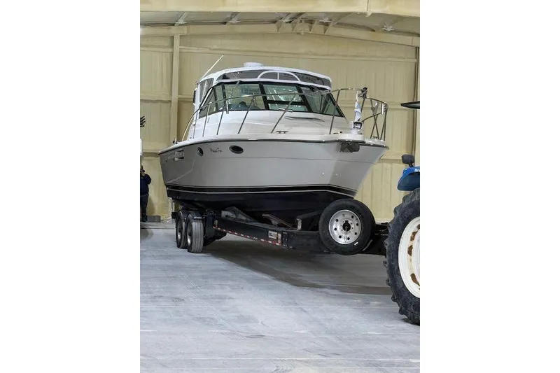 Slide: The Image of 1997 Tiara Yachts 2900 Open on trailer in indoor storage facility. - 8