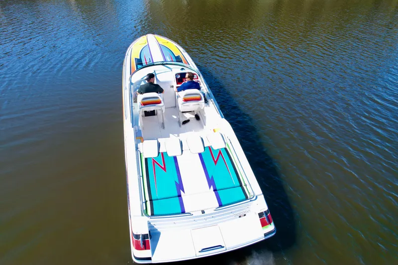 Slide: The Image of 2006 Formula 382 FASTech speedboat cruising on calm water, aerial view. - 8