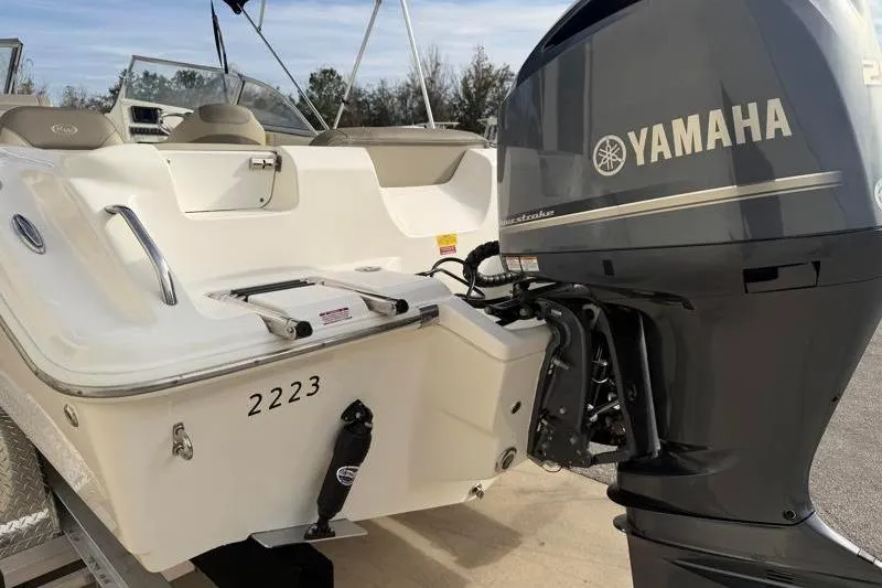Slide: The Image of 2022 Key West 239 DFS boat with Yamaha outboard motor, rear view. - 11