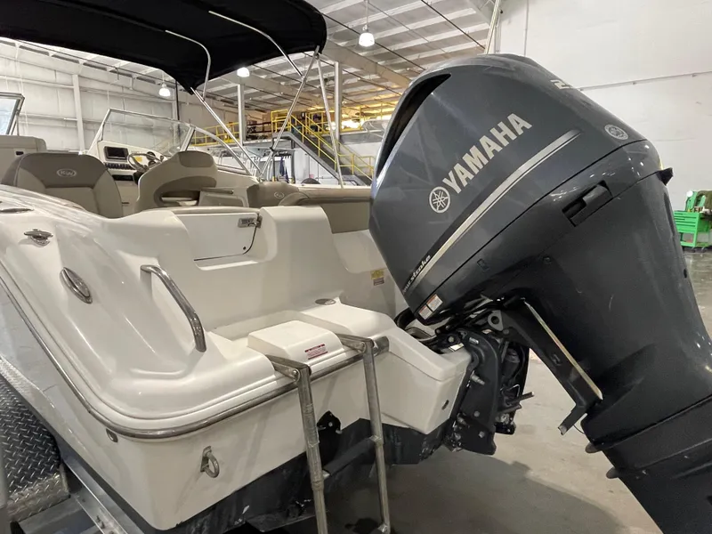 Slide: The Image of 2022 Key West 239 DFS boat with Yamaha engine, named "Hooked Up II." - 12