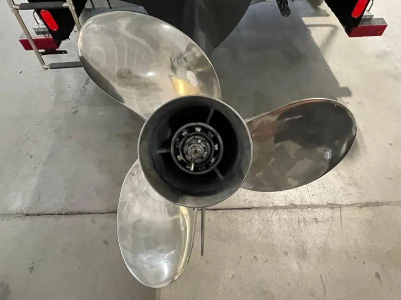 Slide: The Image of 2022 Key West 239 DFS boat interior with cushioned seating and cup holders. - 16