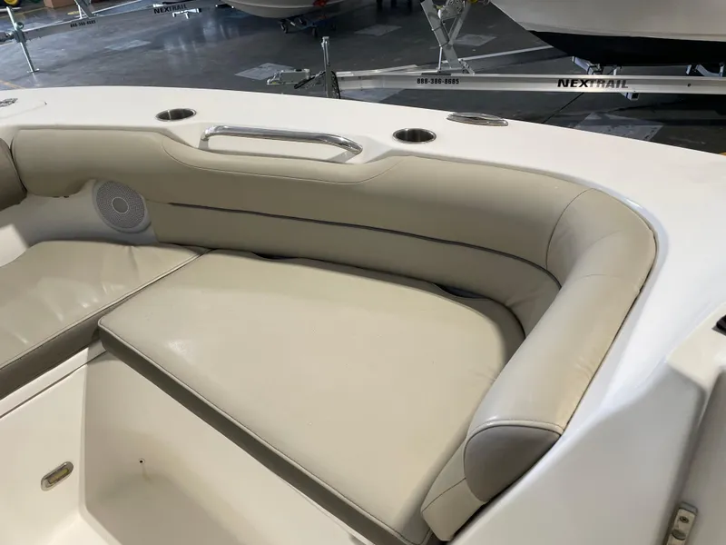 Slide: The Image of 2022 Key West 239 DFS boat dashboard with steering wheel and navigation system. - 19