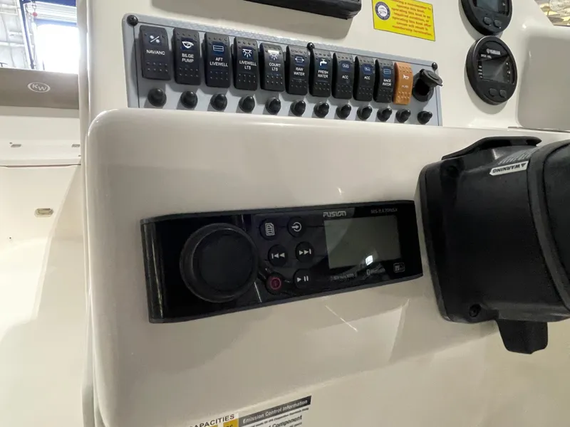 Slide: The Image of Fusion marine stereo system on 2022 Key West 239 DFS boat dashboard. - 24