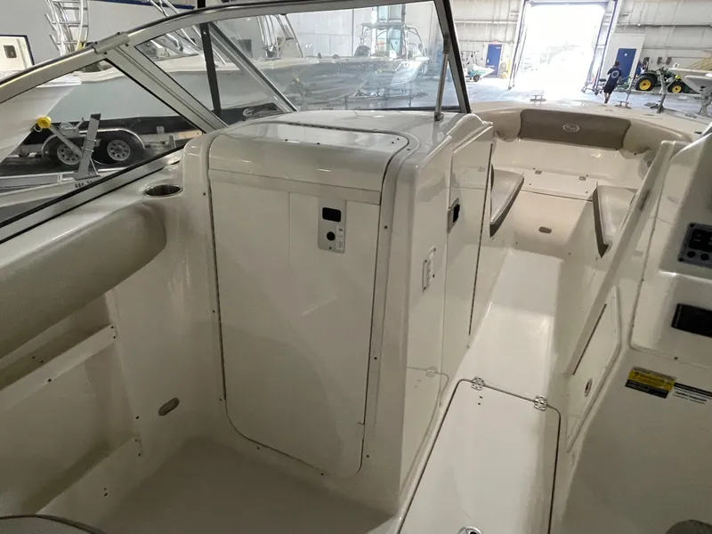 Slide: The Image of 2022 Key West 239 DFS boat interior with sink and seating area. - 28