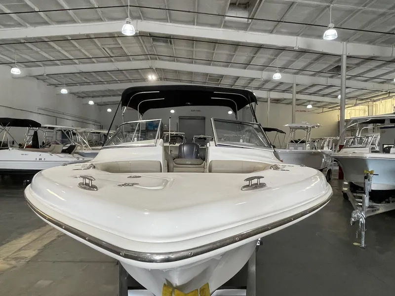 Slide: The Image of 2022 Key West 239 DFS boat on trailer outside a warehouse. - 7