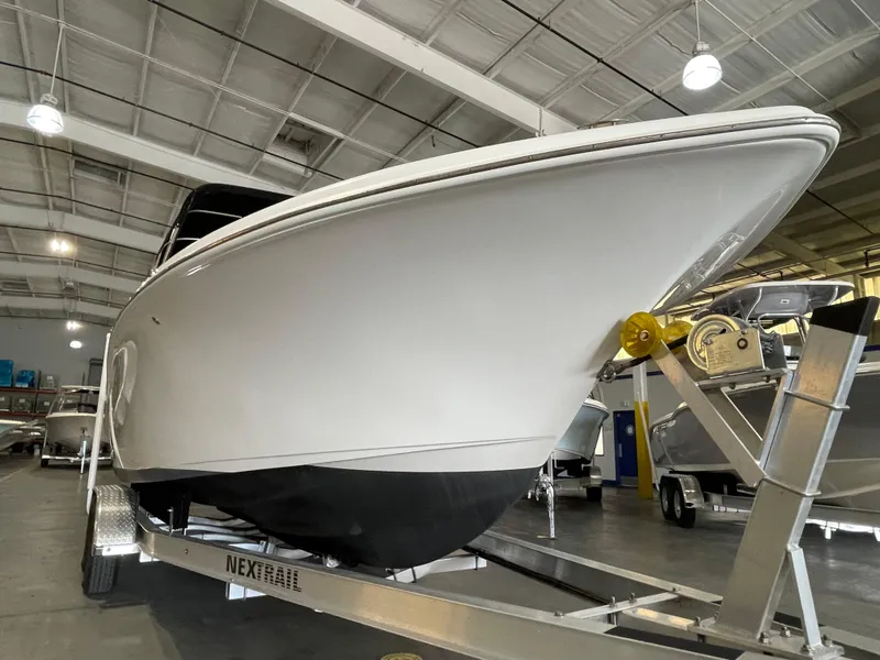Slide: The Image of 2022 Key West 239 DFS boat on trailer, viewed from the front. - 9