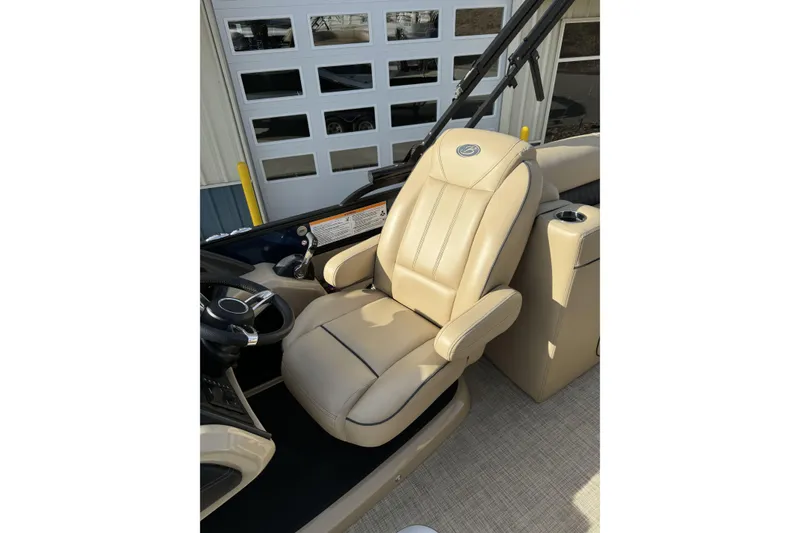 Slide: The Image of Luxurious beige captain's chair in 2019 Barletta L23QC SS boat interior. - 14