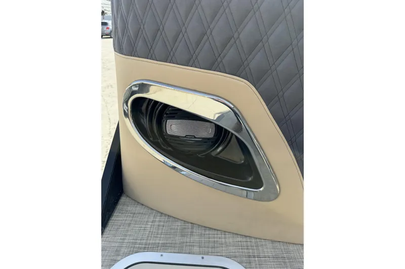 Slide: The Image of 2019 Barletta L23QC SS interior detail with quilted upholstery and chrome speaker. - 24