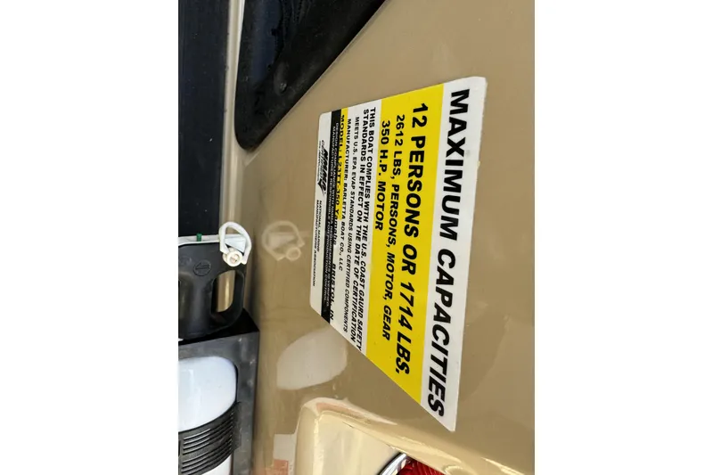 Slide: The Image of Capacity label on 2019 Barletta L23QC SS, maximum 12 persons or 1714 lbs. - 26