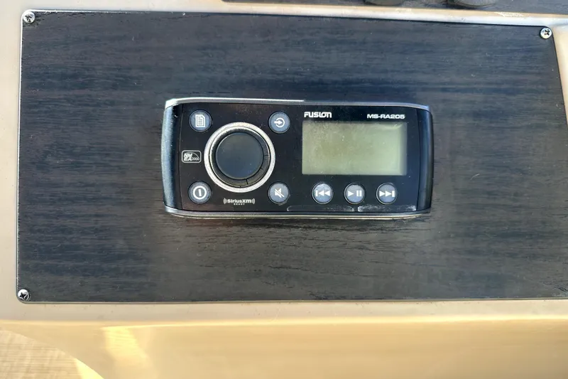 Slide: The Image of Fusion MS-RA205 stereo system on 2017 Harris Cruiser 220 boat dashboard. - 37