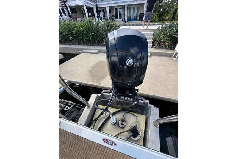 Slide: The Image of 2017 Harris Cruiser 220 boat with Mercury outboard motor at dockside. - 44