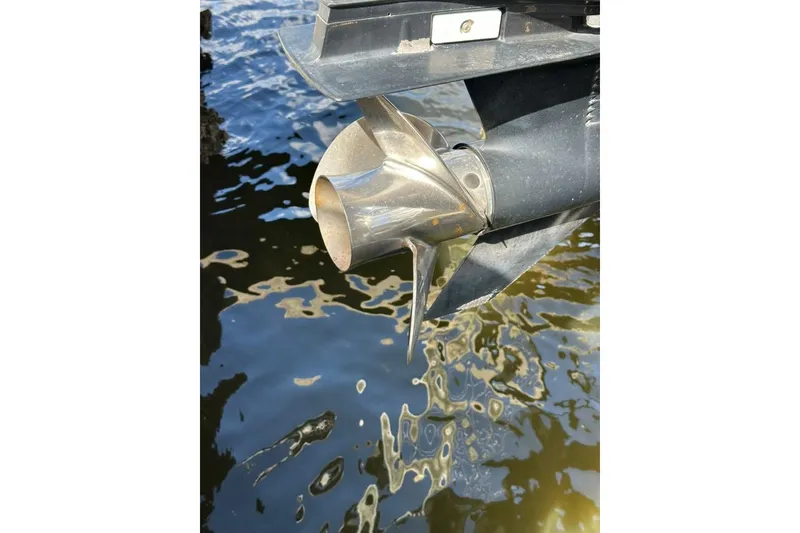 Slide: The Image of Close-up of a 2017 Harris Cruiser 220 boat propeller in water. - 47