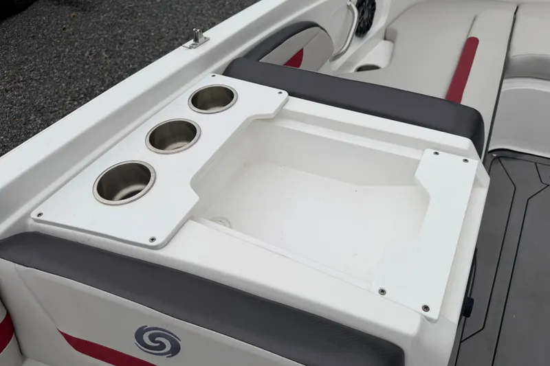 Slide: The Image of 2023 Hurricane SunDeck Sport 205 OB boat interior with cup holders and seating. - 38
