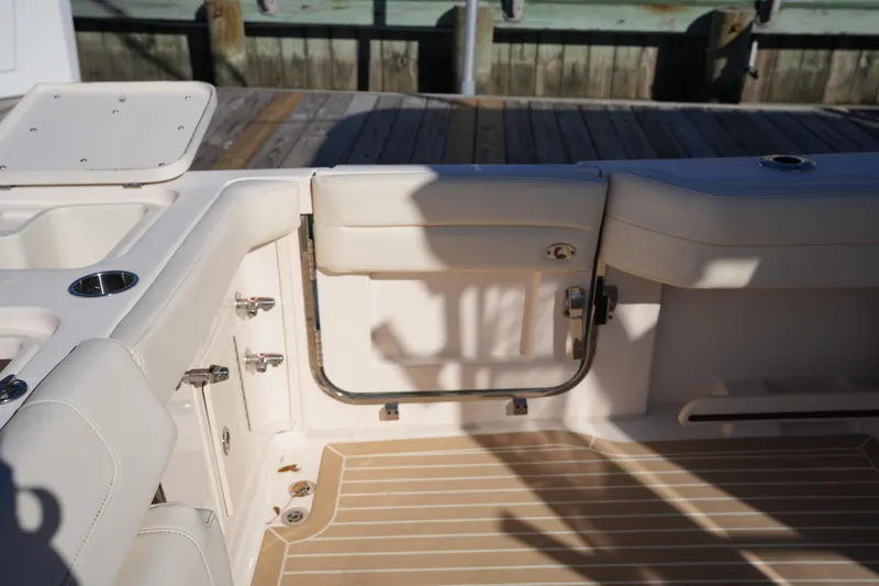 Slide: The Image of 2023 Grady-White Marlin 300 boat interior with seating and deck details. - 32