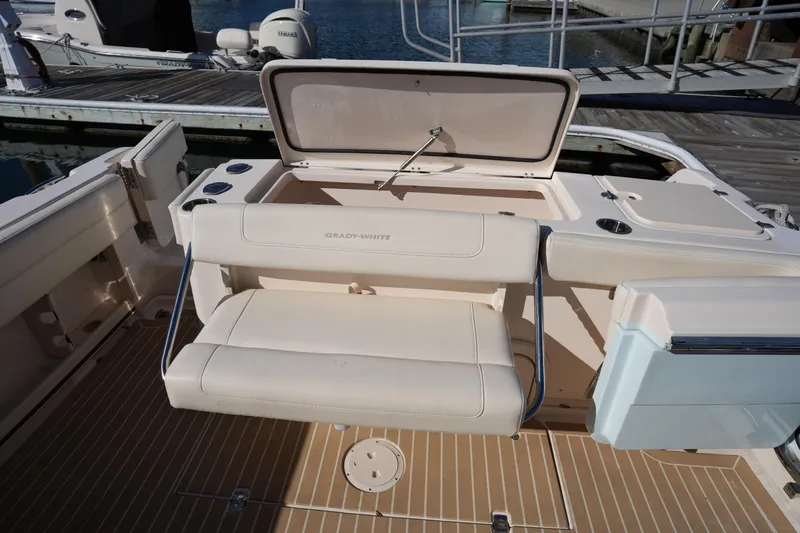 Slide: The Image of 2023 Grady-White Marlin 300 boat interior with seating and storage compartments. - 34