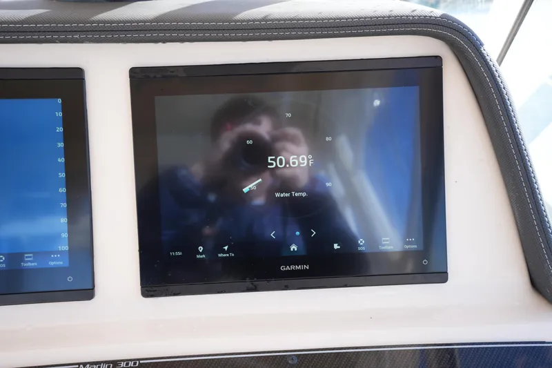 Slide: The Image of Garmin display showing water temperature on 2023 Grady-White Marlin 300 boat. - 44