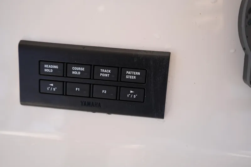 Slide: The Image of Control panel on 2023 Grady-White Marlin 300 boat with Yamaha steering functions. - 47