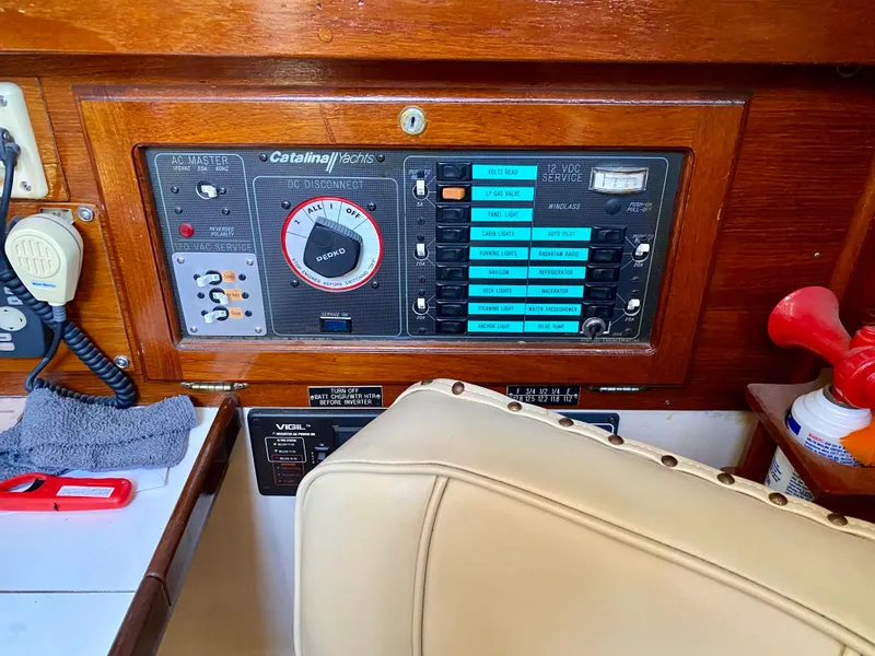 Slide: The Image of Interior view of a 1989 Catalina 36 yacht control panel. - 13