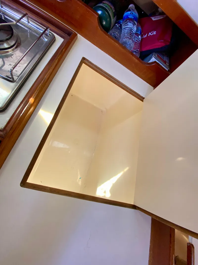 Slide: The Image of Interior of 1989 Catalina 36 boat with storage space. - 24