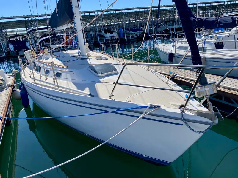 Slide: The Image of 1989 Catalina 36 sailboat docked in marina. - 4