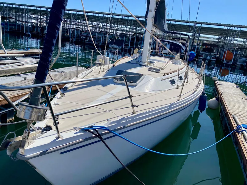 Slide: The Image of 1989 Catalina 36 sailboat docked in marina. - 5
