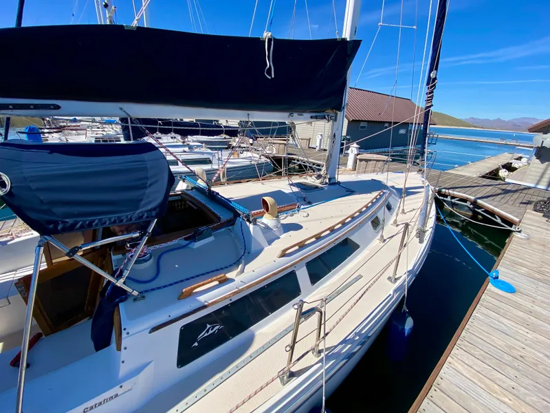 Slide: The Image of 1989 Catalina 36 sailboat docked at marina. - 8