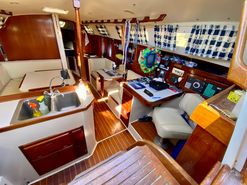 Slide: The Image of Interior of a 1989 Catalina 36 yacht with wood finish. - 9