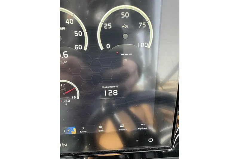 Slide: The Image of 2022 Cobalt R4 Surf dashboard displaying 128 engine hours and various gauges. - 19
