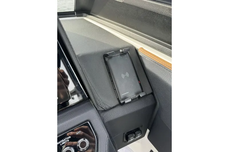 Slide: The Image of 2022 Cobalt R4 Surf dashboard with wireless charging pad. - 21