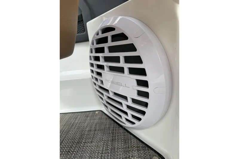 Slide: The Image of White Roswell speaker on 2022 Cobalt R4 Surf boat interior. - 25