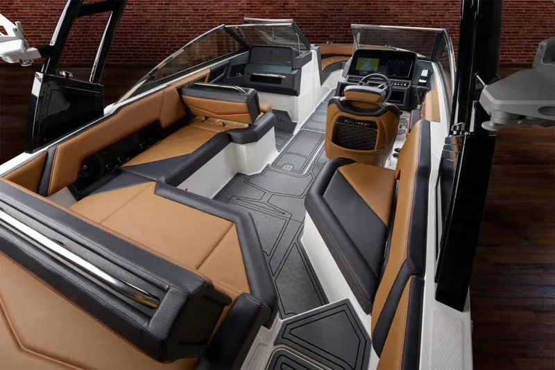 Slide: The Image of Manufacturer Provided Image: 2022 Cobalt R4 Surf boat interior with luxurious brown and black seating, modern dashboard, and sleek design. - 33