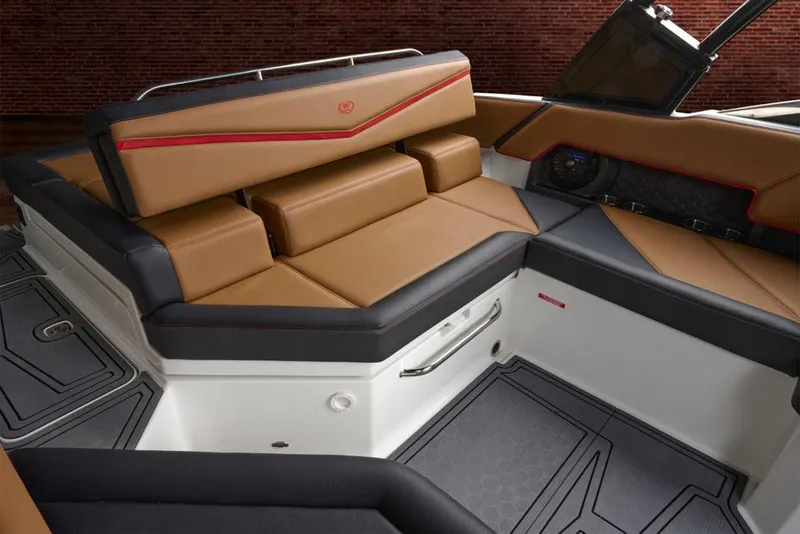 Slide: The Image of Manufacturer Provided Image: 2022 Cobalt R4 Surf boat interior with tan and black seating. - 36