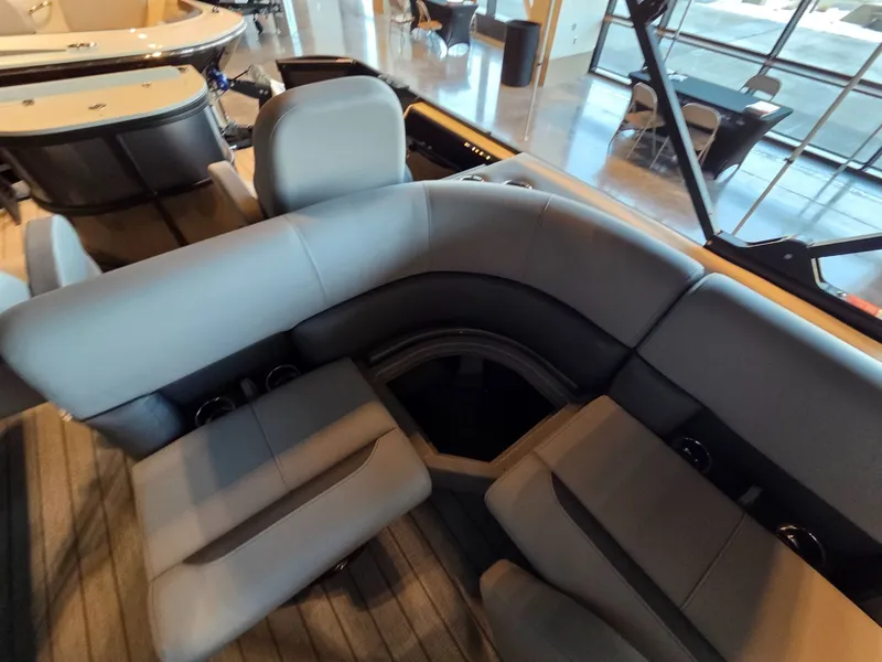 Slide: The Image of 2026 Bentley Pontoons FISH 200 interior seating area. - 15