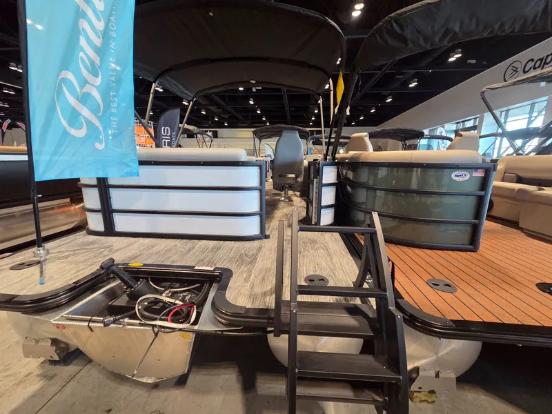 Slide: The Image of 2026 Bentley Pontoons Legacy 200 Cruise XL at a boat show. - 4