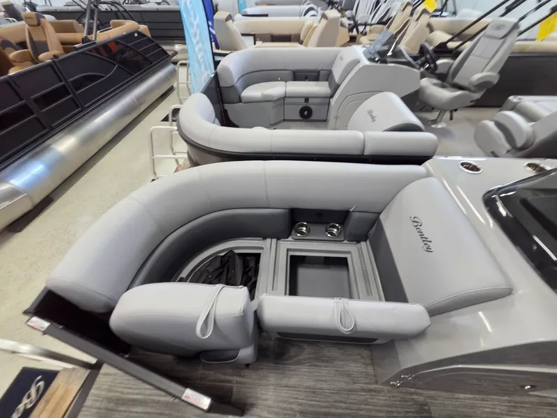 Slide: The Image of 2026 Bentley Pontoons Legacy 200 Navigator interior with luxurious gray seating. - 19