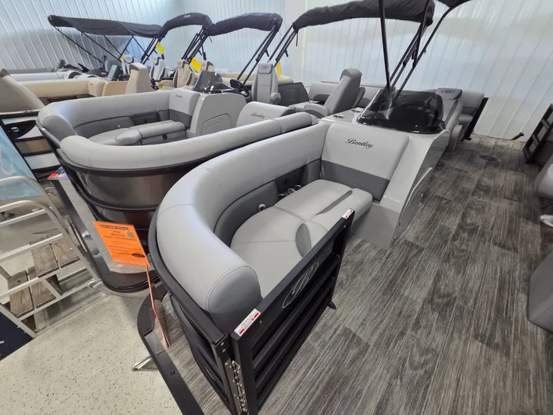 Slide: The Image of 2026 Bentley Pontoons Legacy 200 Navigator in showroom. - 4