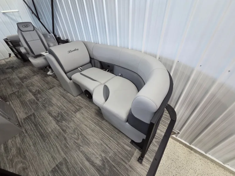 Slide: The Image of Interior of Bentley Pontoons Legacy 200 Navigator 2026 with gray leather seating. - 5