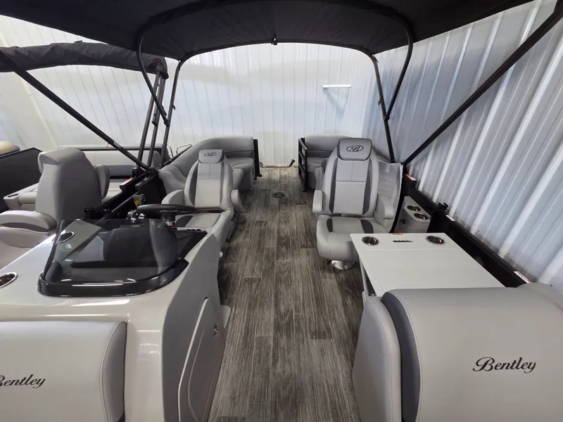 Slide: The Image of Interior of the 2026 Bentley Pontoons Legacy 200 Navigator. - 6